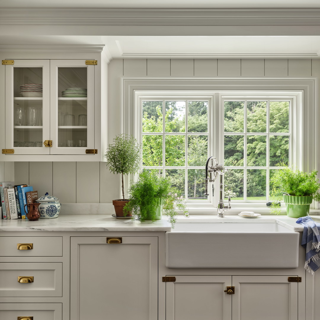 a kitchen with a sink and a window