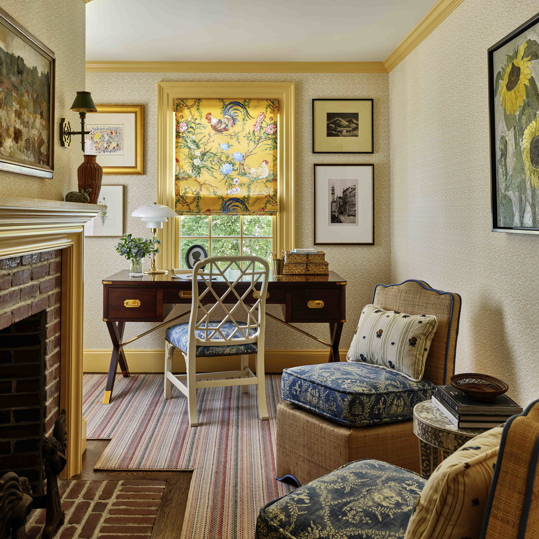 a living room filled with furniture and a fire place