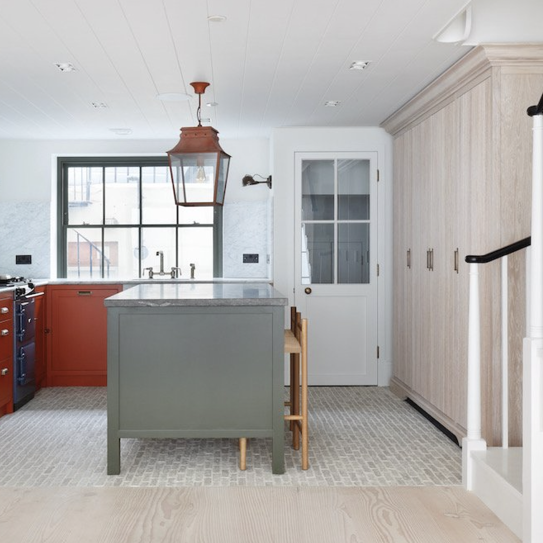 a kitchen with an island in the middle of the room