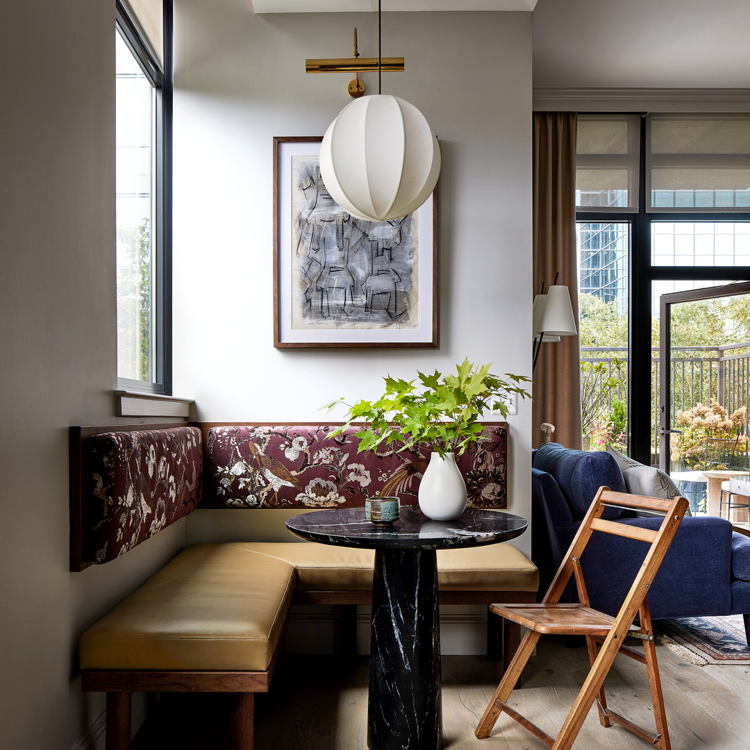 a living room with a couch and a table