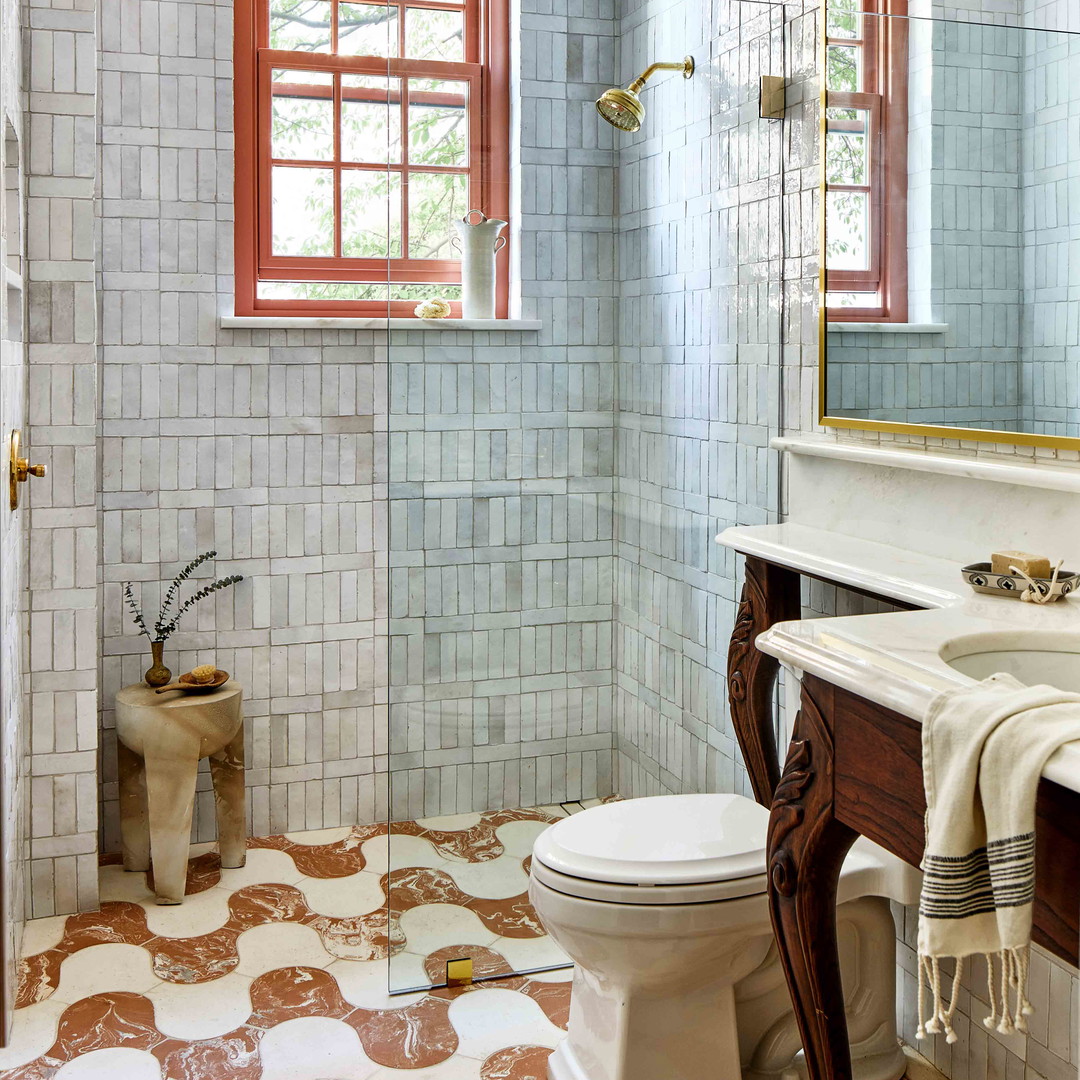 a bathroom with a toilet and a sink