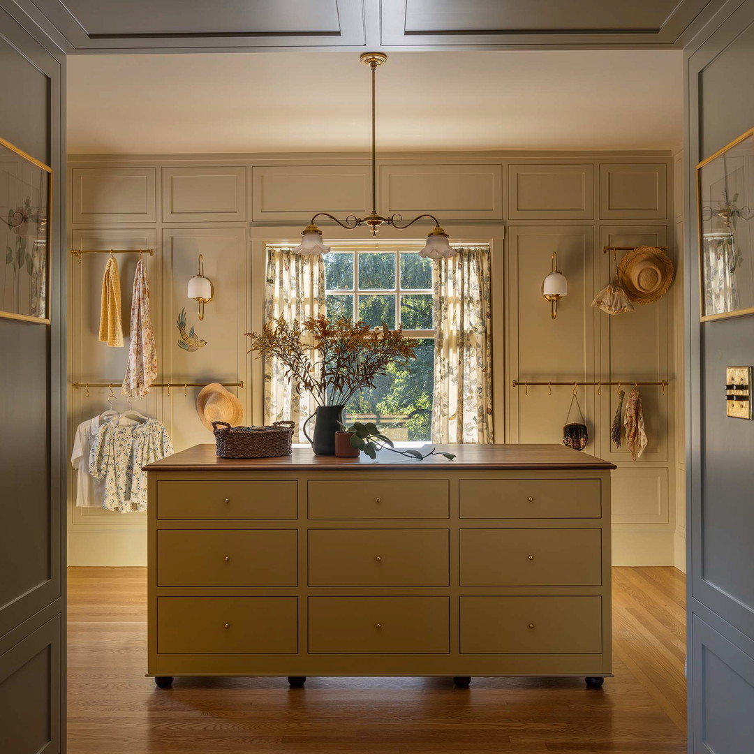 a kitchen with a center island in the middle of the room