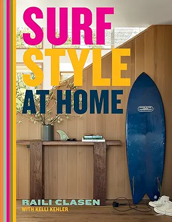 a surfboard sitting on top of a wooden floor