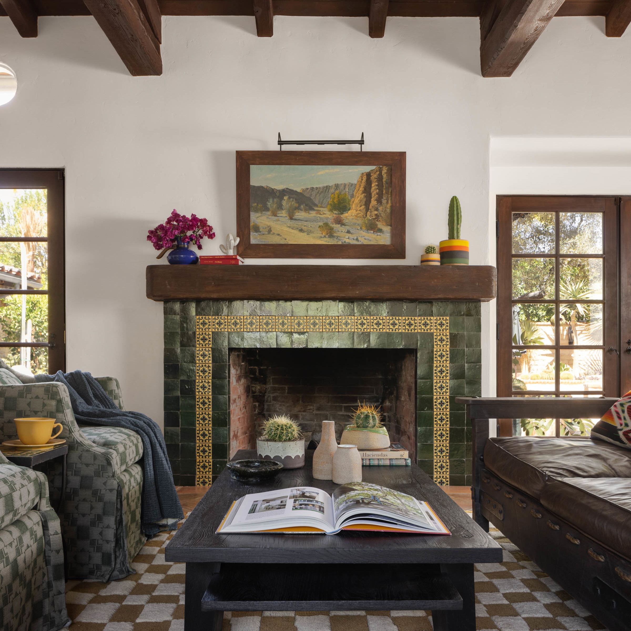 a living room filled with furniture and a fire place