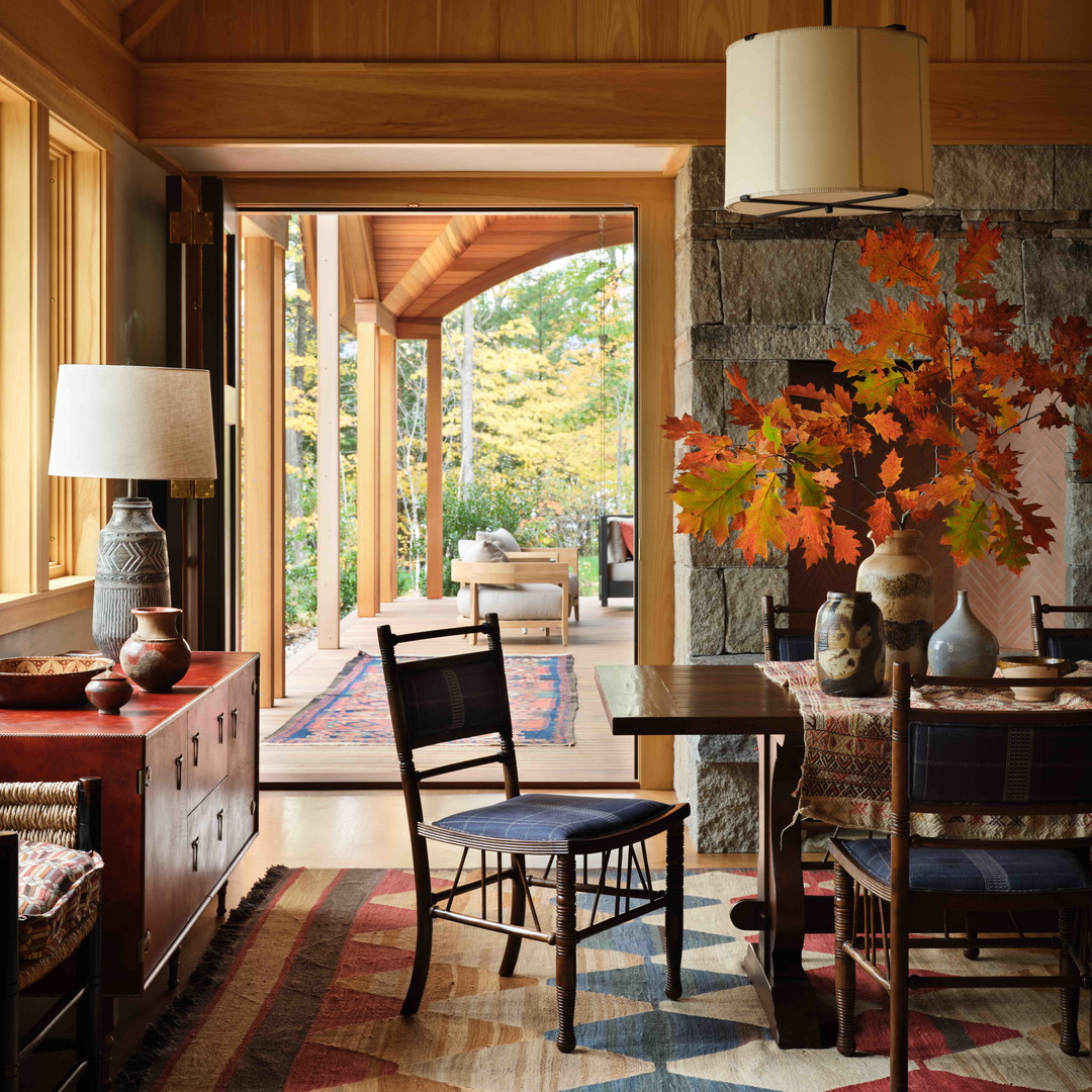 a dining room with a table and chairs