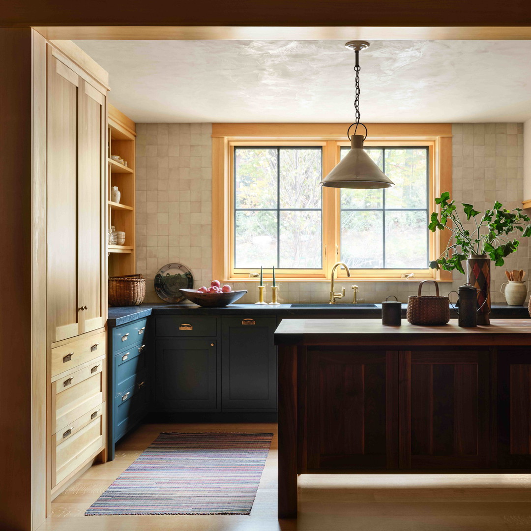 a kitchen with a sink and a window