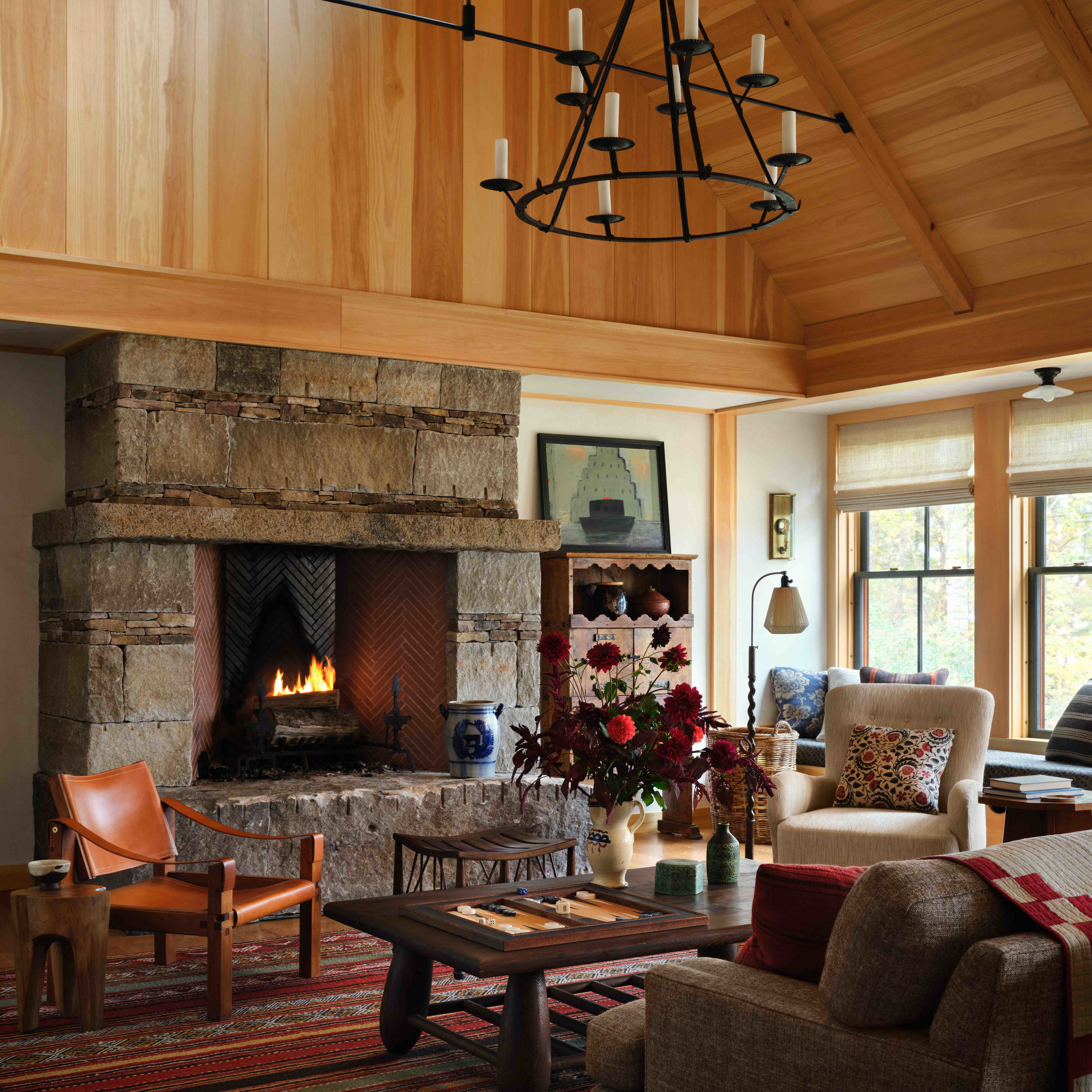 a living room filled with furniture and a fire place