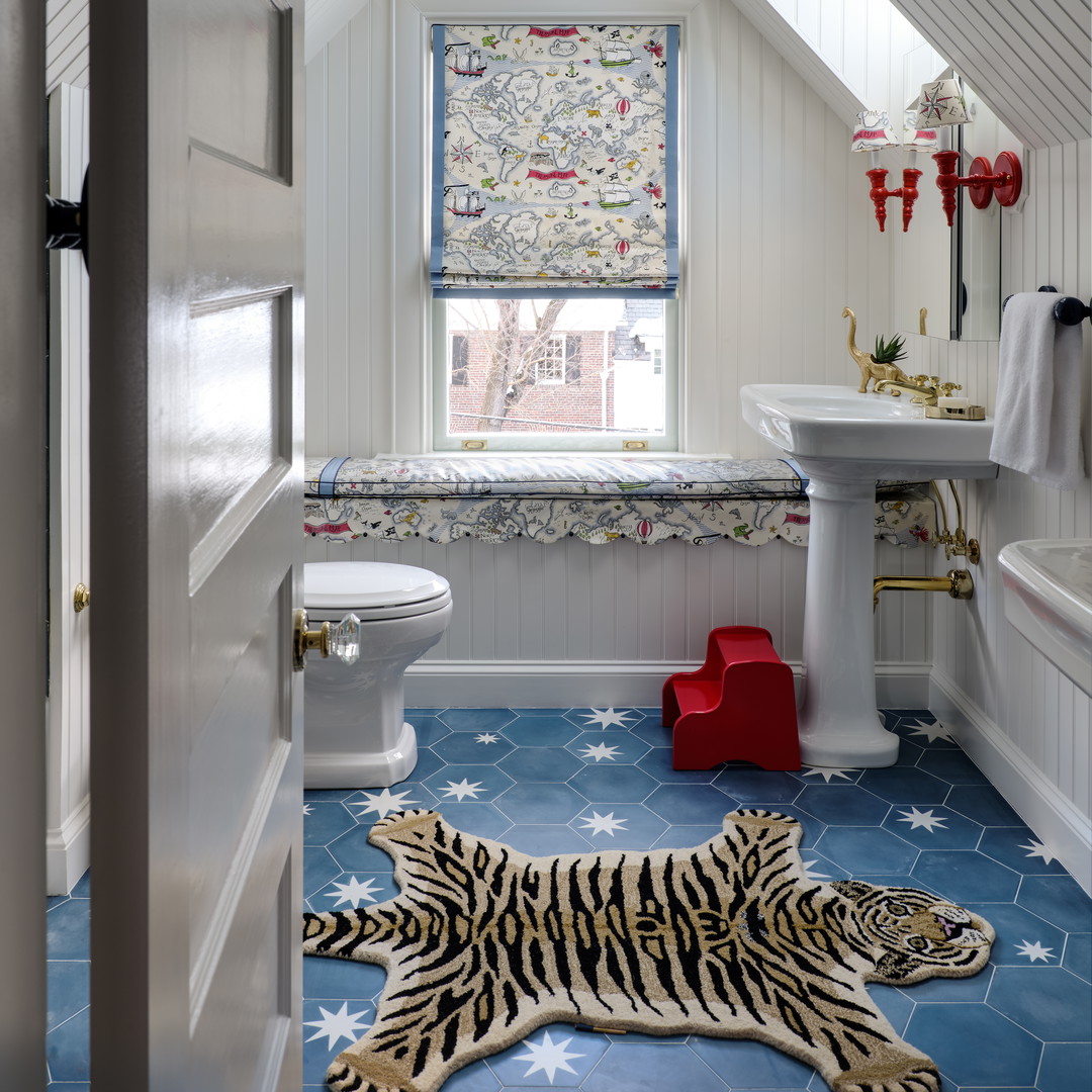 a bathroom with a tiger rug on the floor