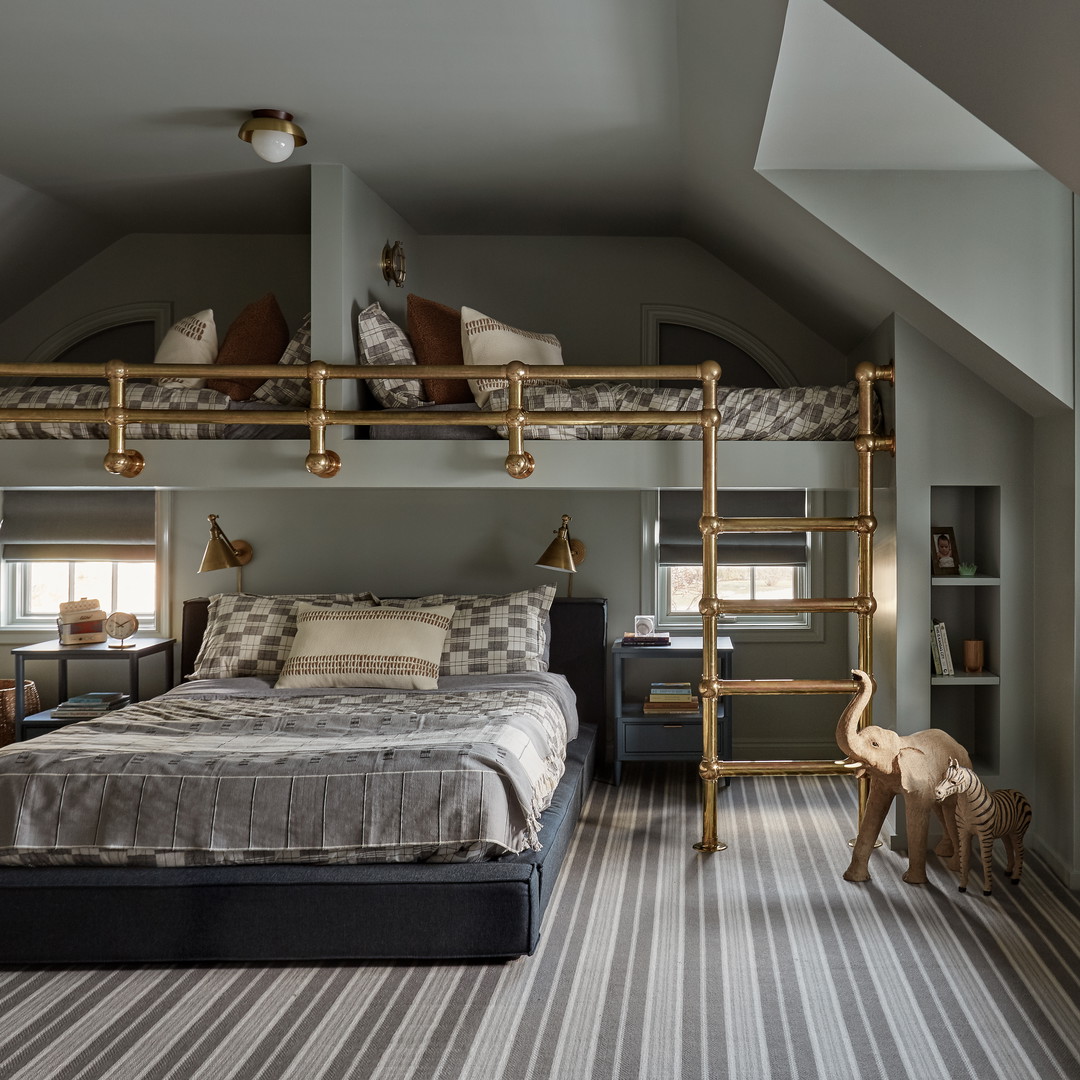 a bedroom with a loft bed and bunk beds