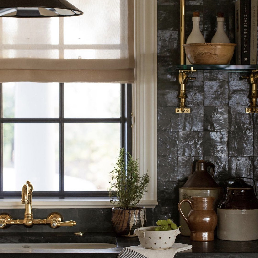 a kitchen with a sink and a window