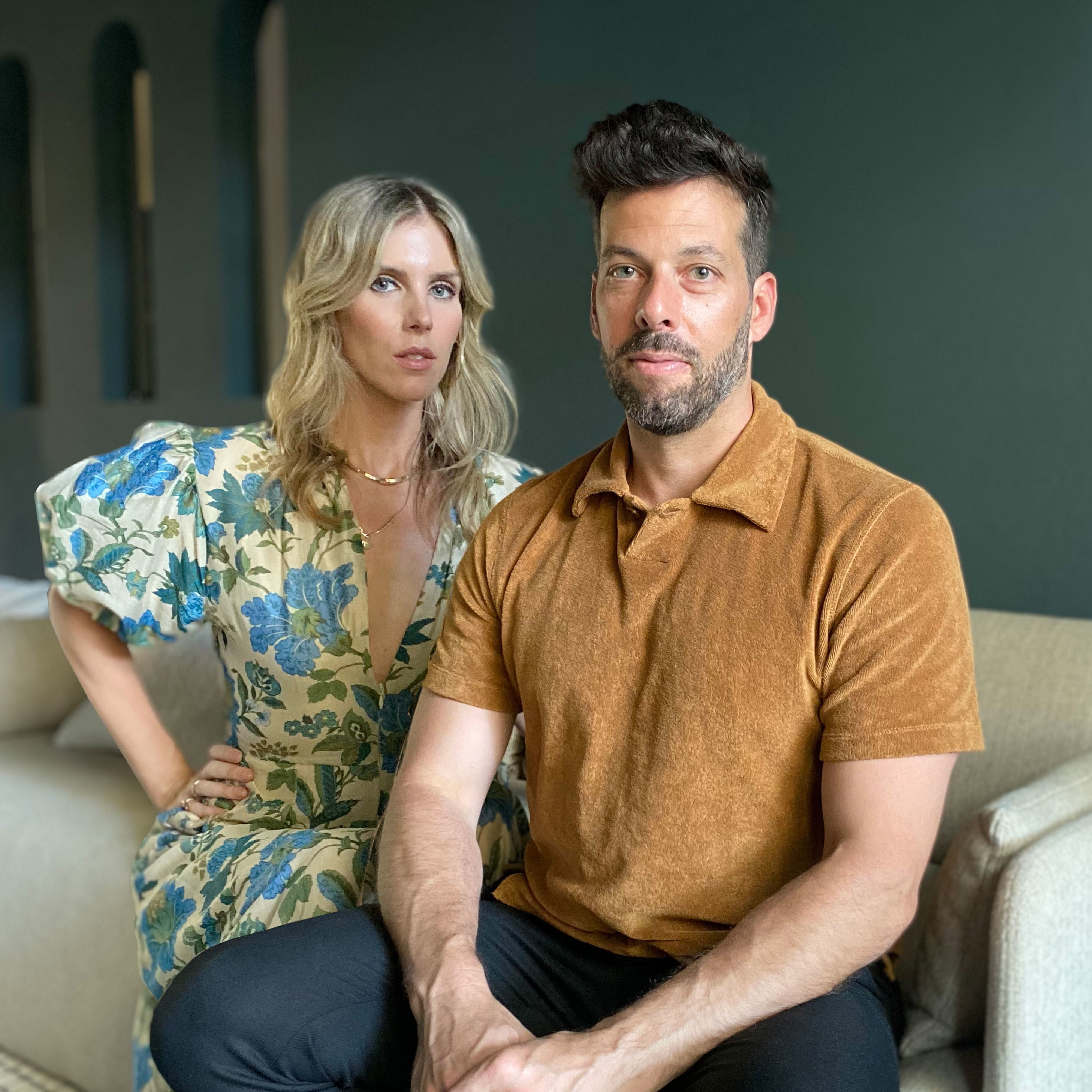 a man and a woman sitting on a couch