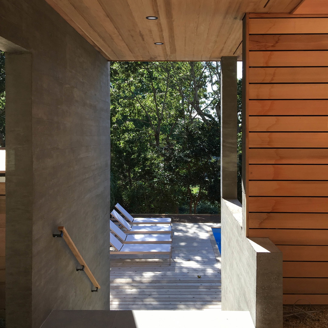 a view of a wooden deck from inside a house