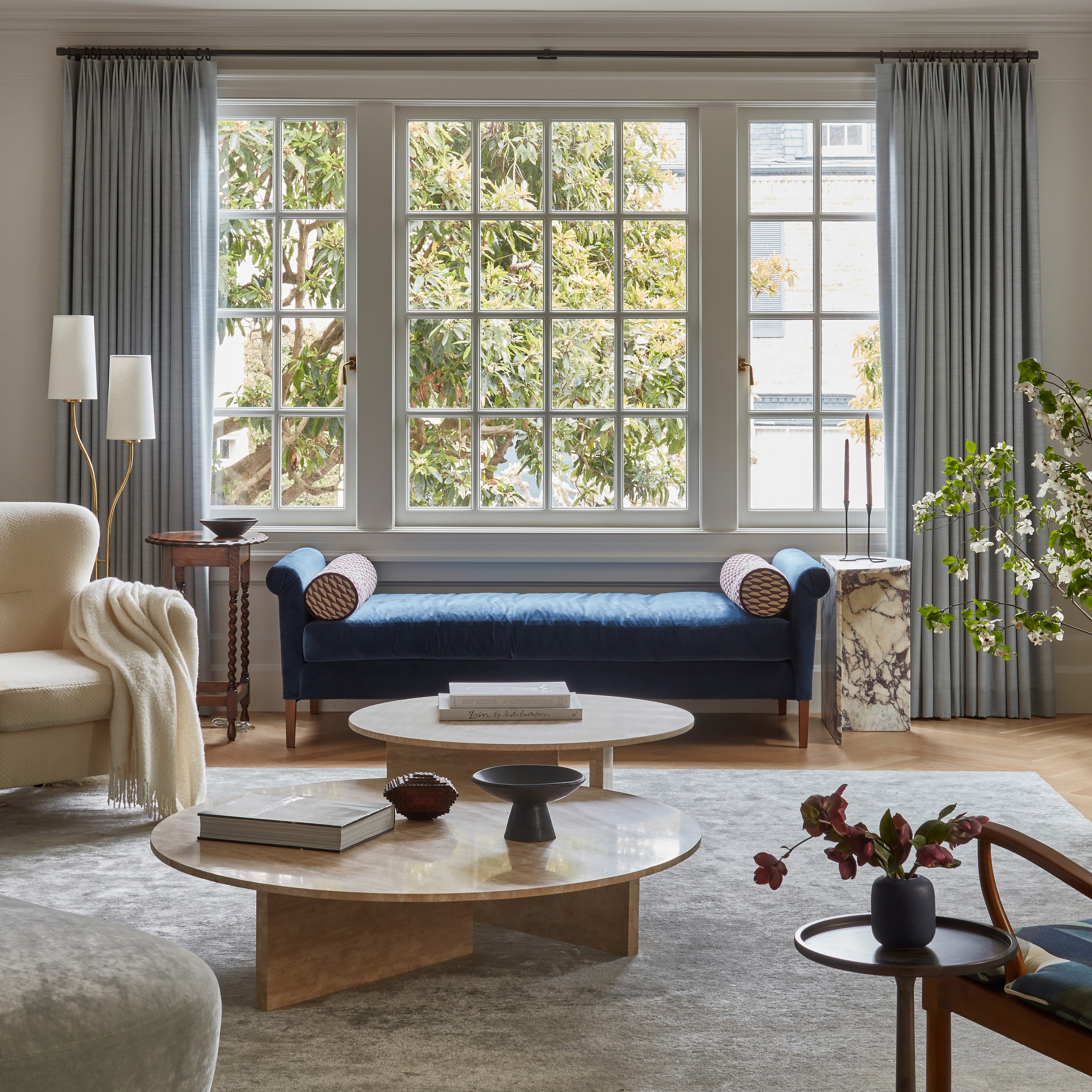 a living room filled with furniture and a fire place