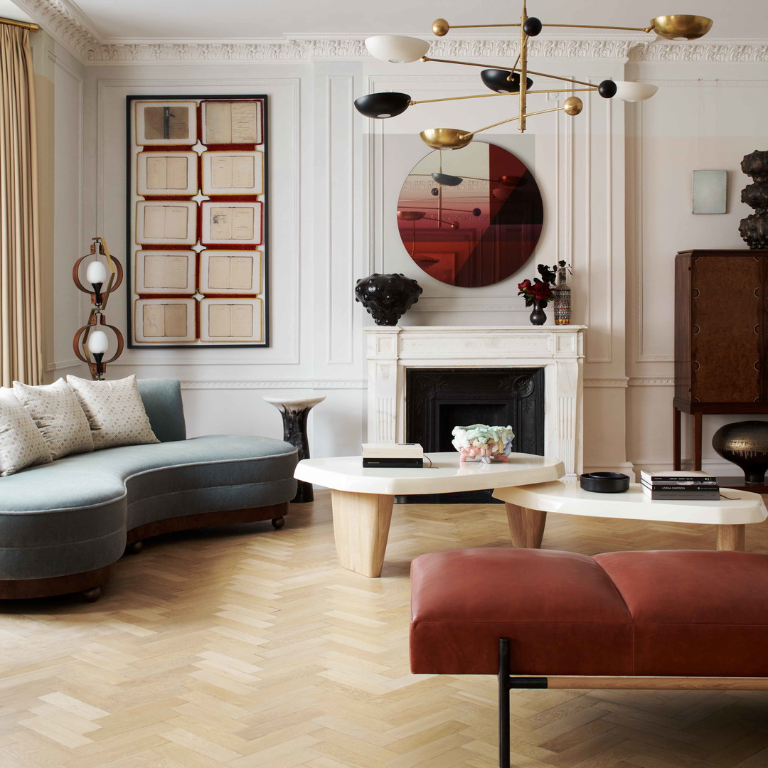 a living room filled with furniture and a fire place