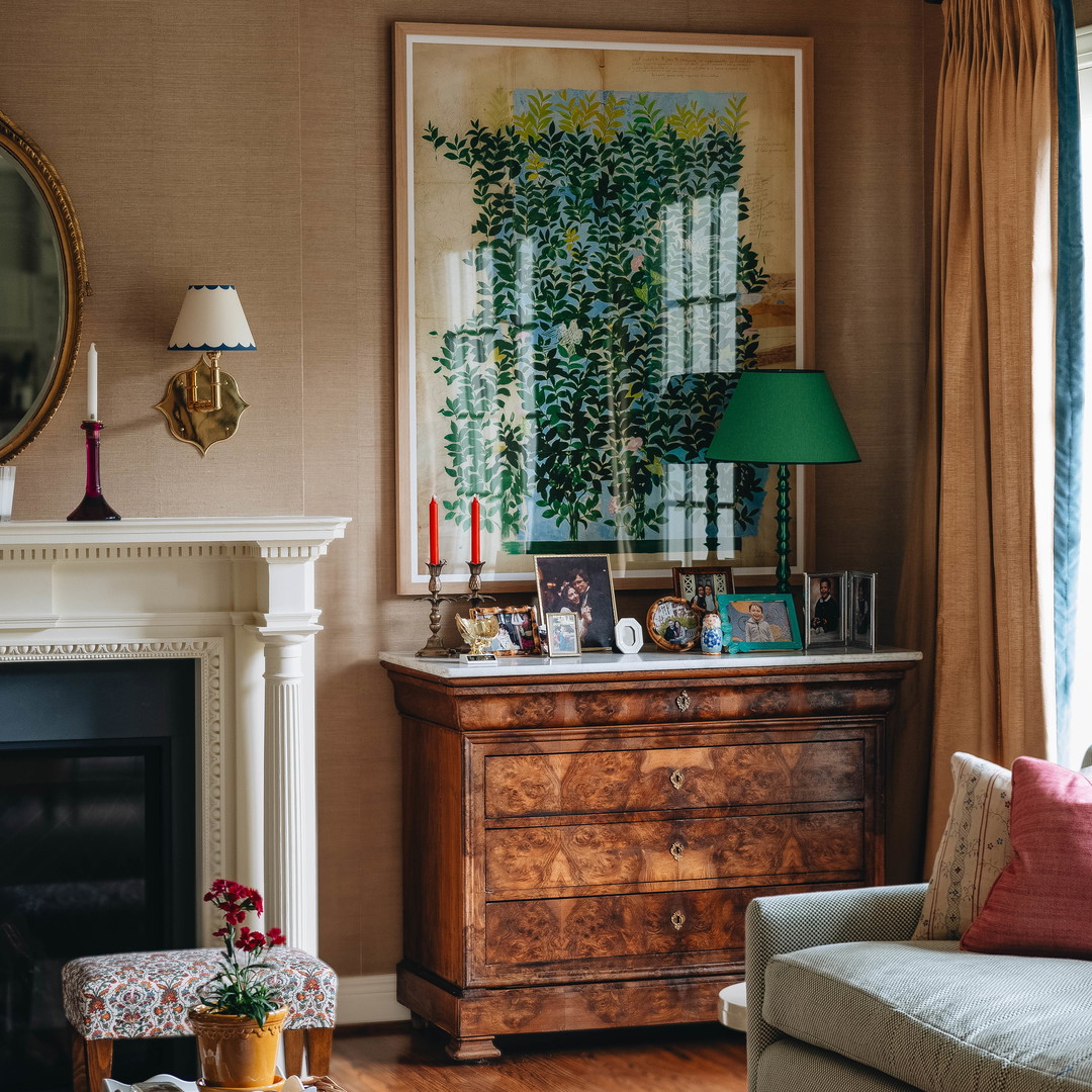 a living room filled with furniture and a fire place