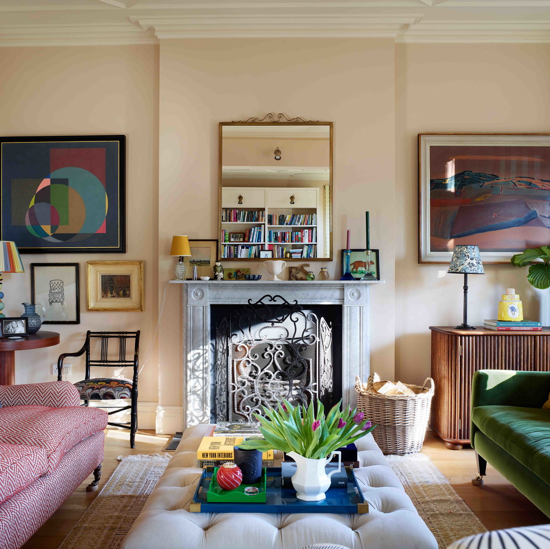 a living room filled with furniture and a fire place