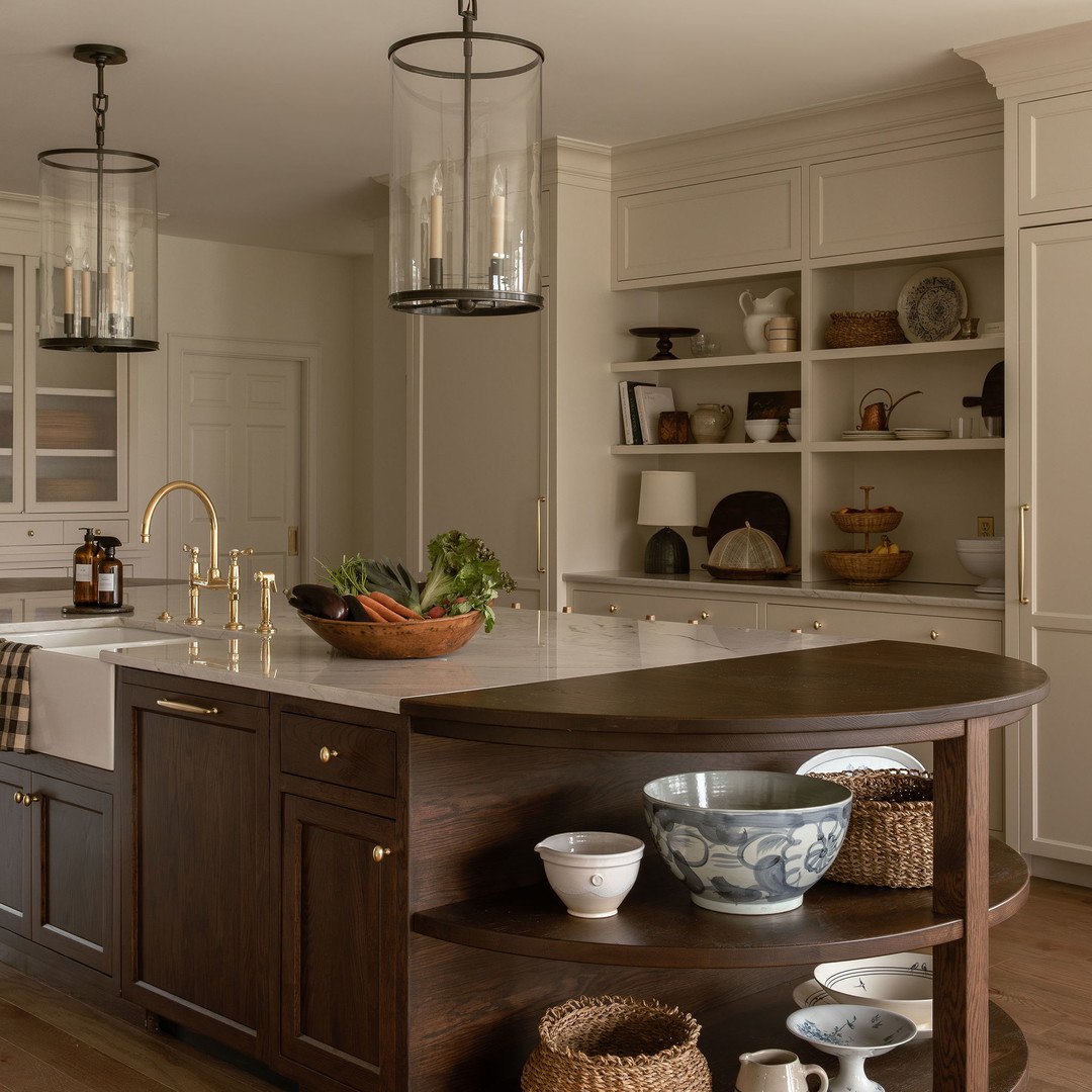 a kitchen with a center island and a sink