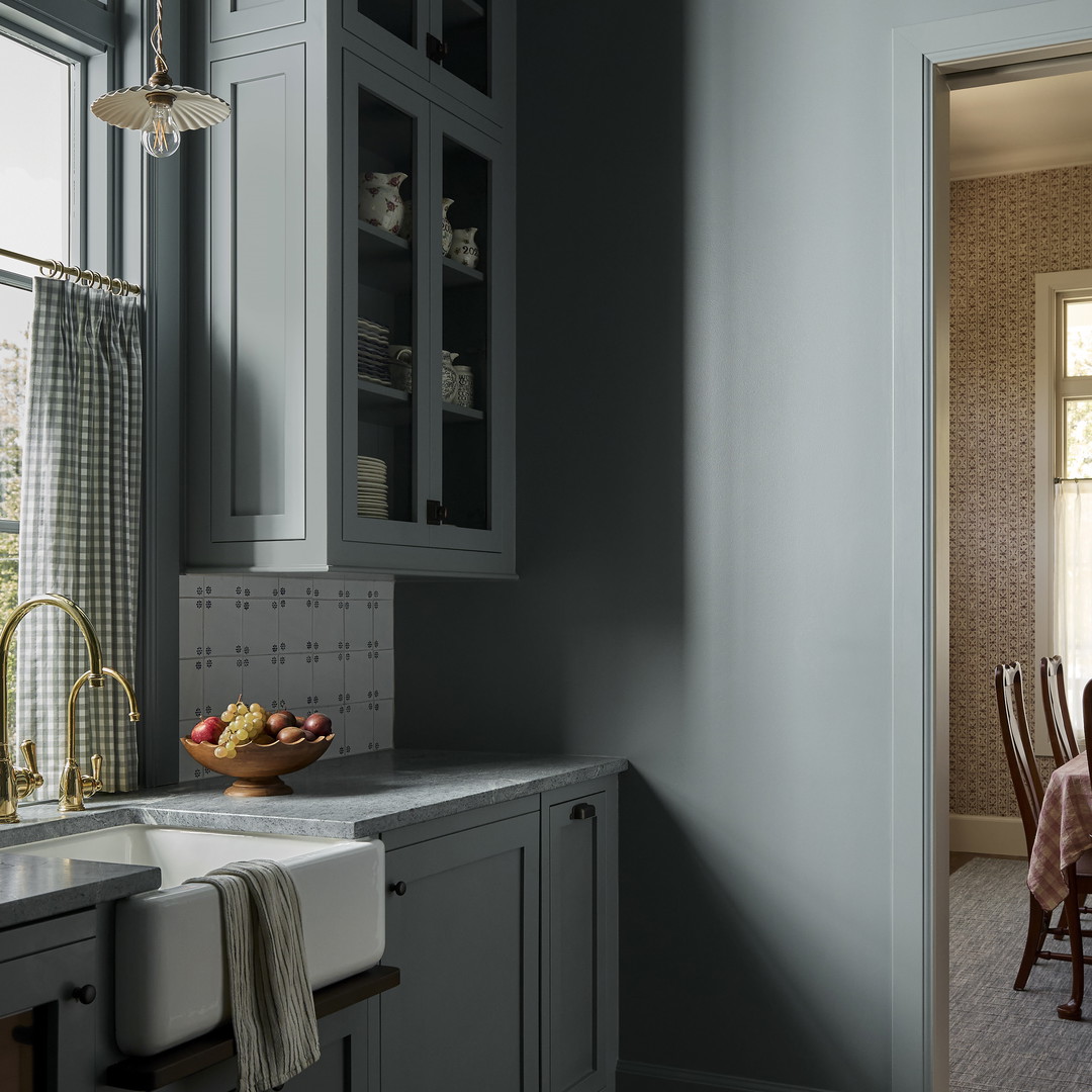 a kitchen with a sink and a window