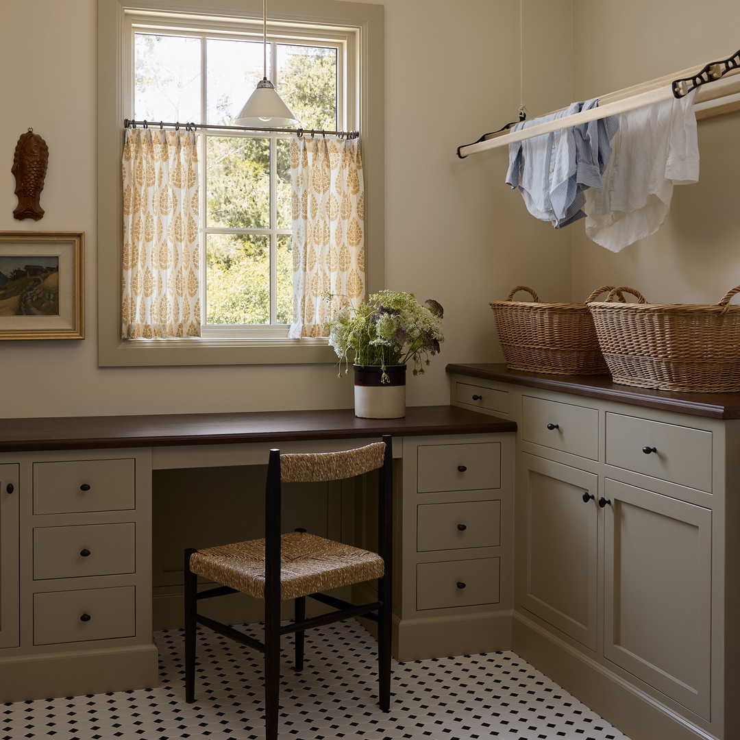 a room with a desk and a window