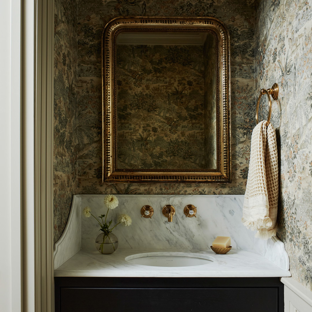 a bathroom sink with a mirror above it