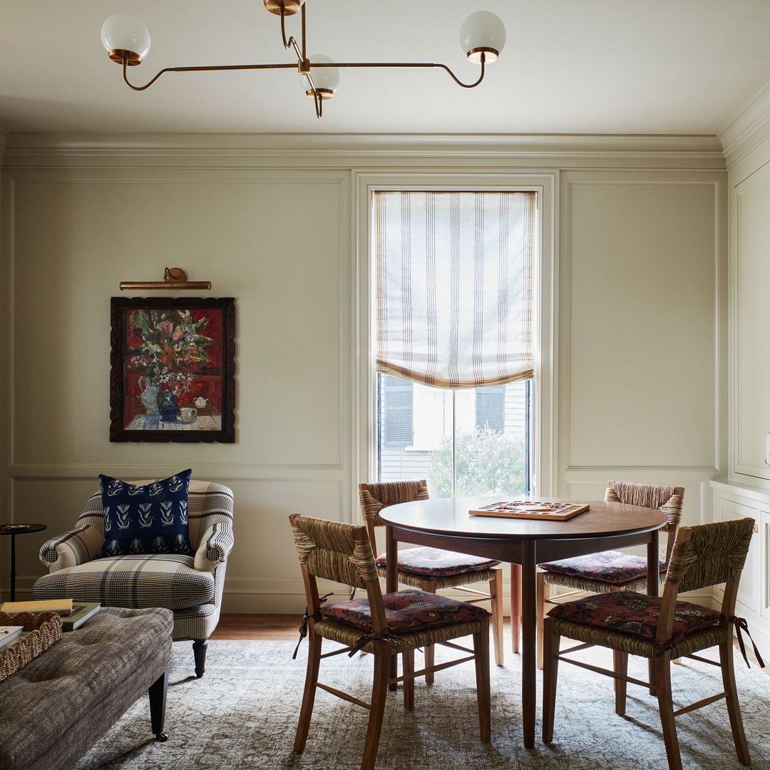 a living room with a couch and a table