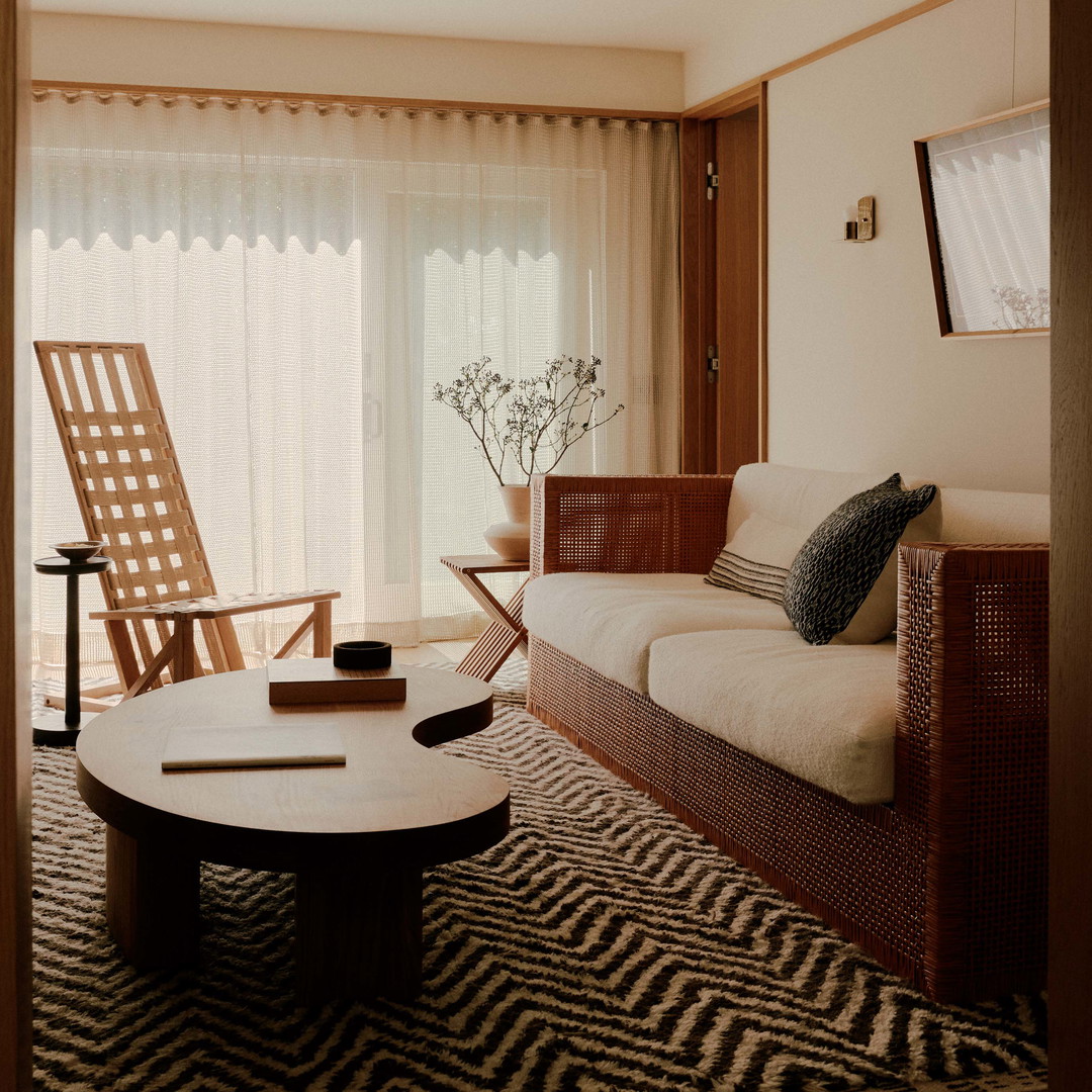a living room with a couch and a table