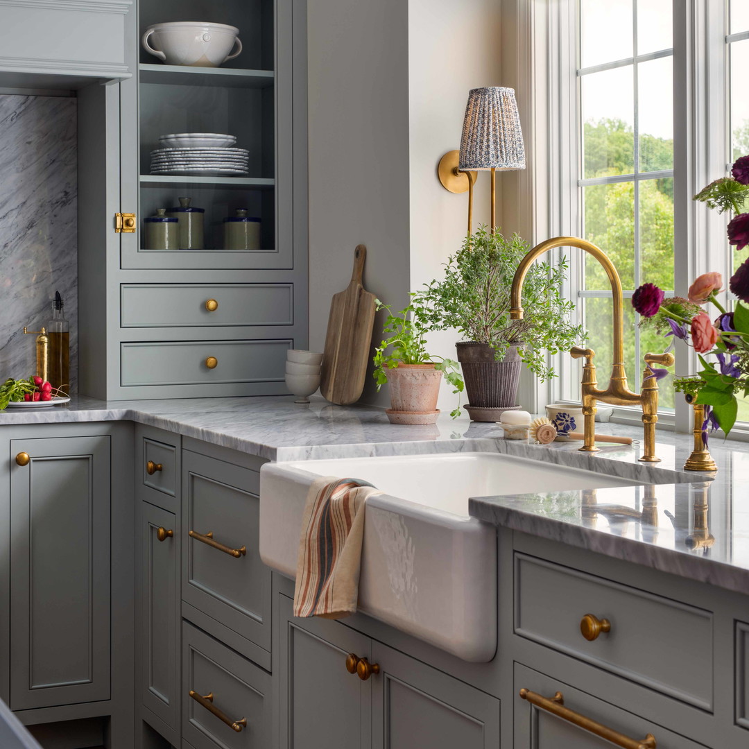 a kitchen with a sink and a window