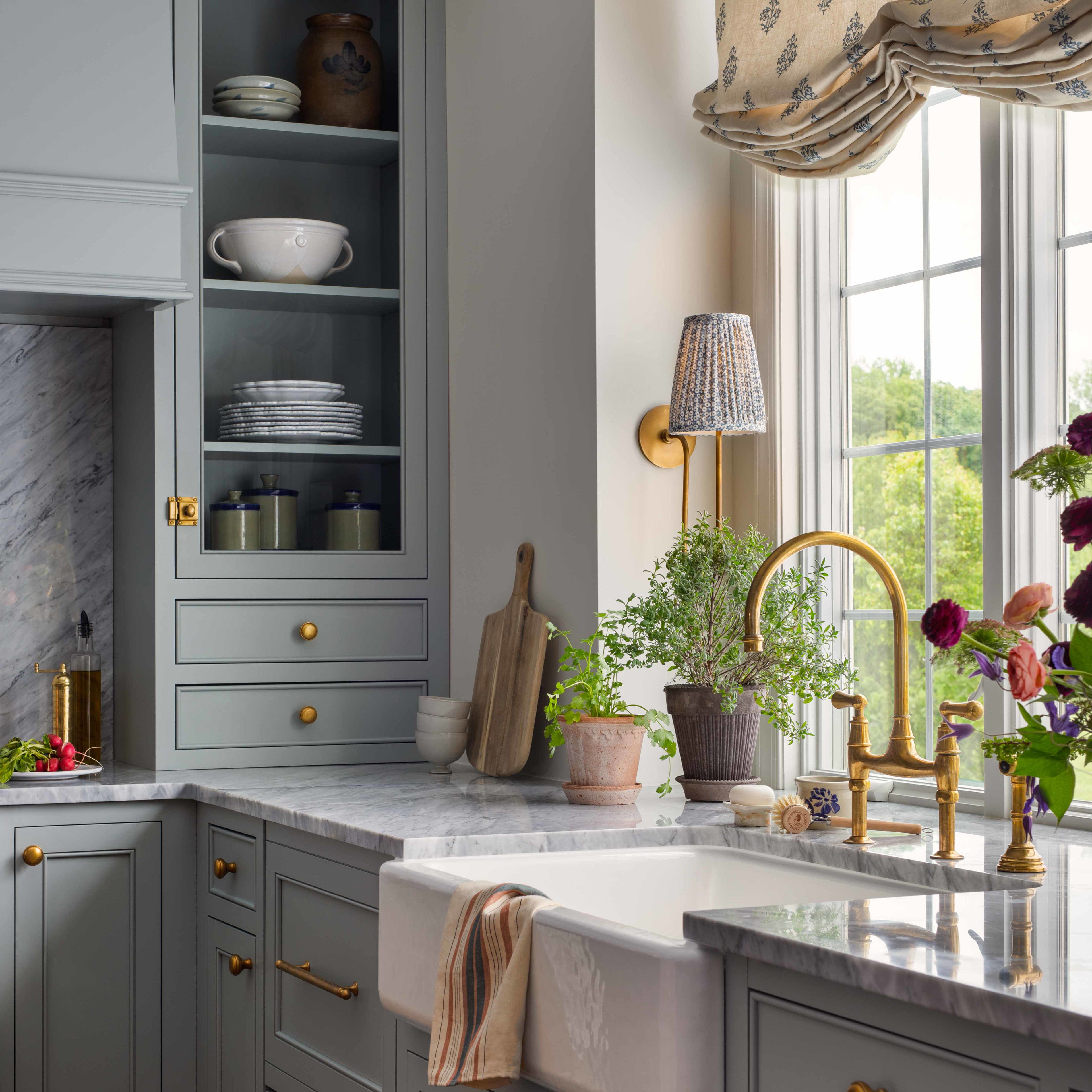 a kitchen with a sink and a window