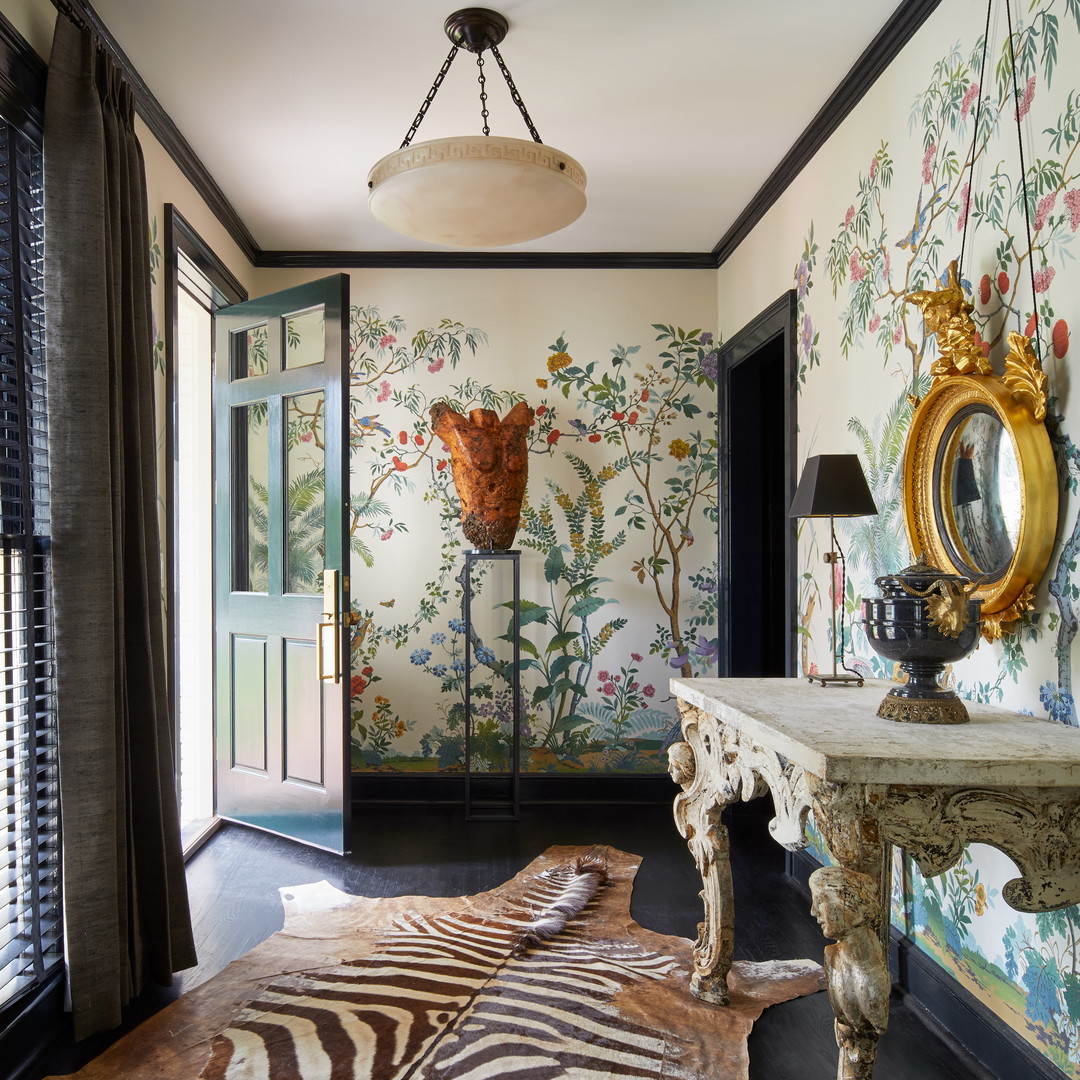 a room with a zebra rug and a mirror