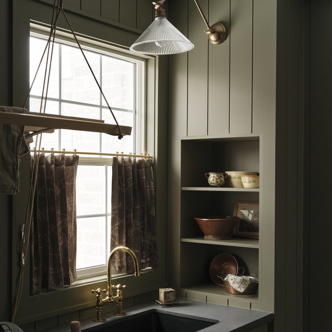 a kitchen with a sink and a window