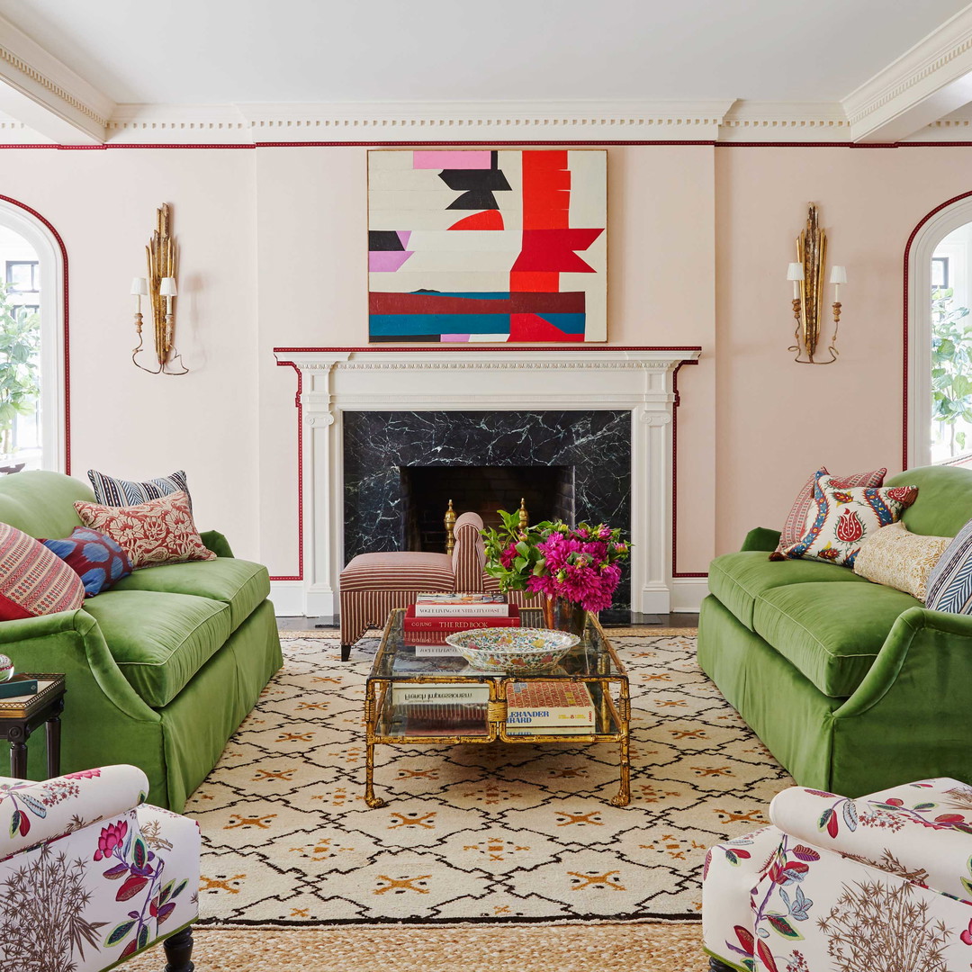 a living room filled with furniture and a fire place