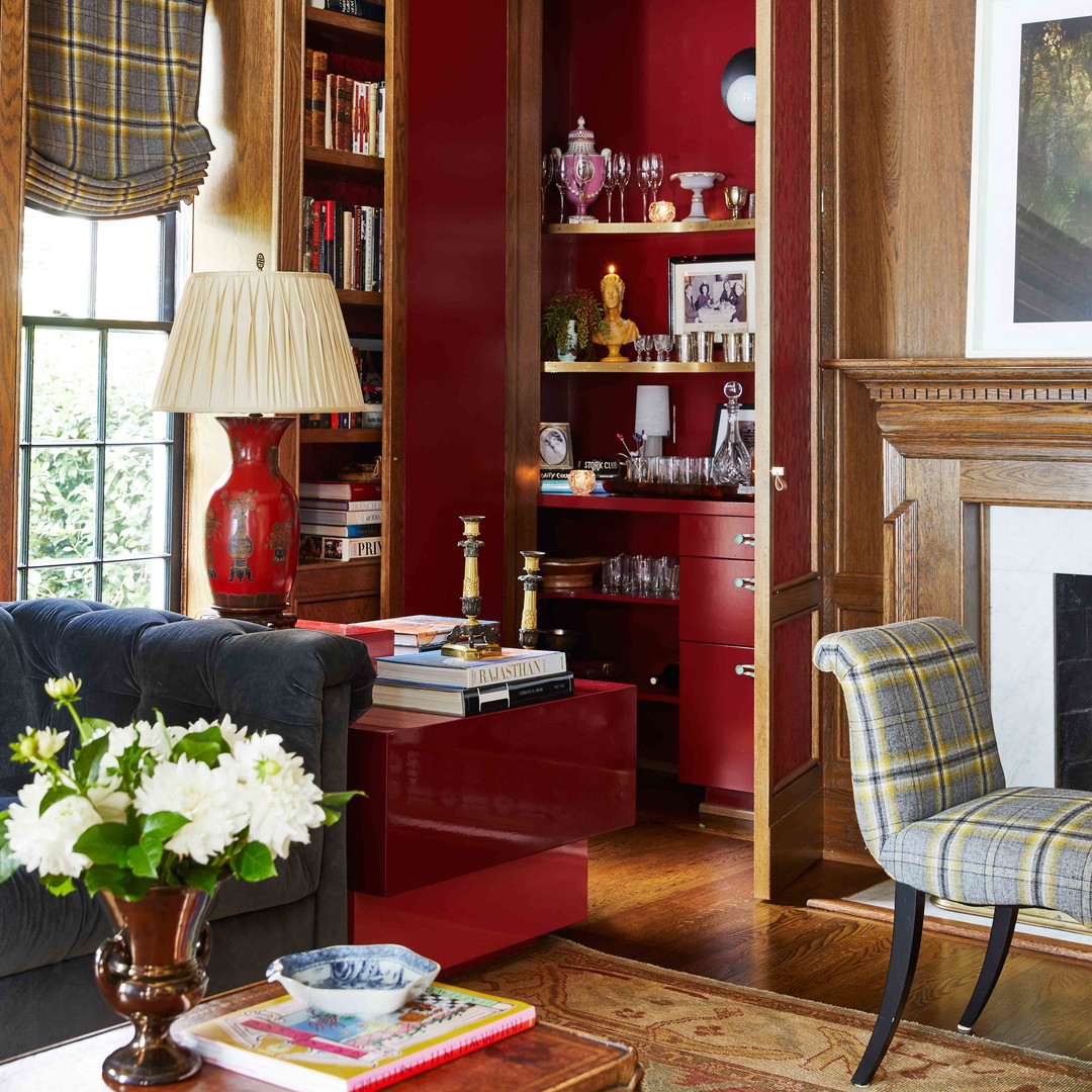 a living room filled with furniture and a fire place
