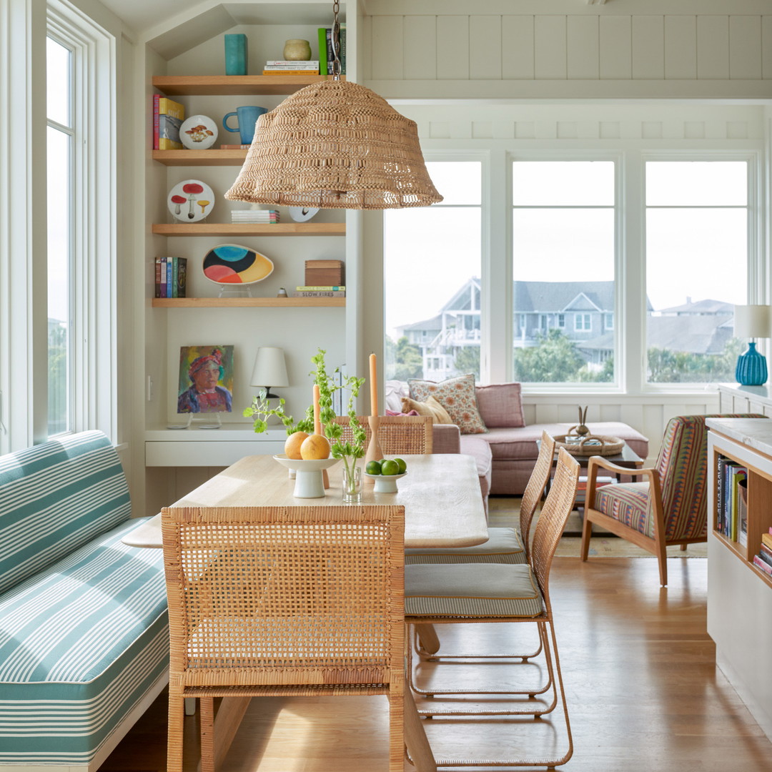 a living room with a couch a table and chairs
