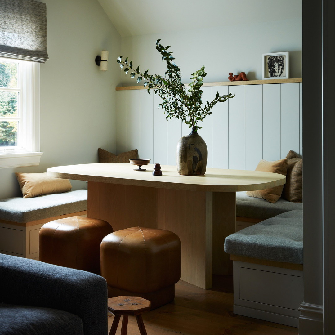 a living room with a table and a couch