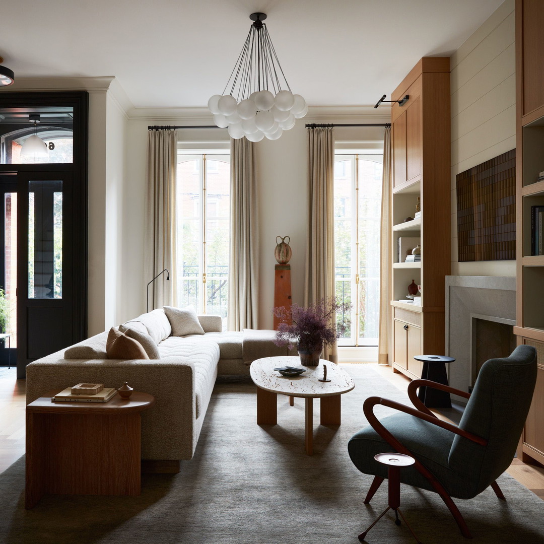 a living room filled with furniture and a fire place