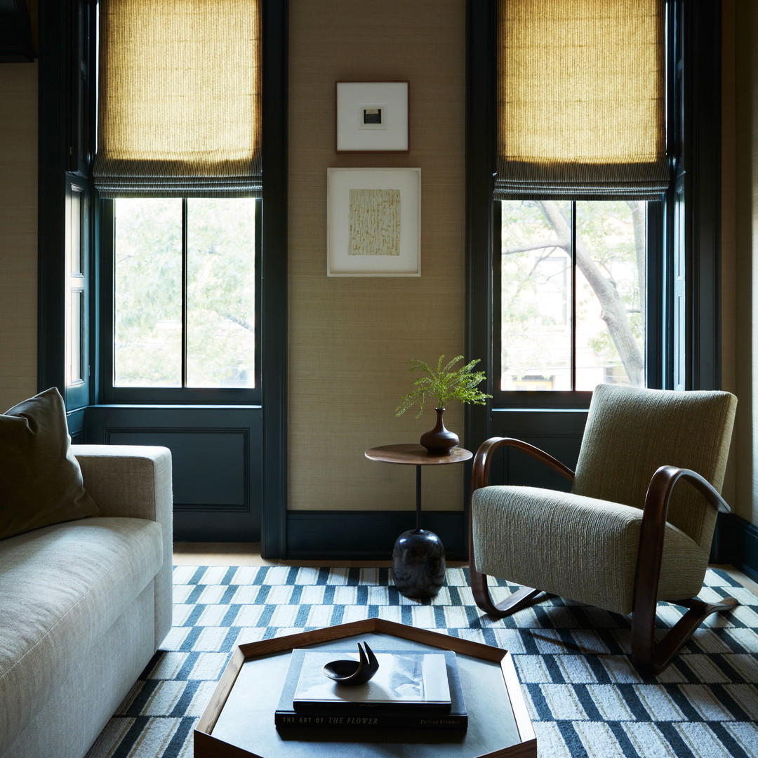 a living room with two couches and a coffee table