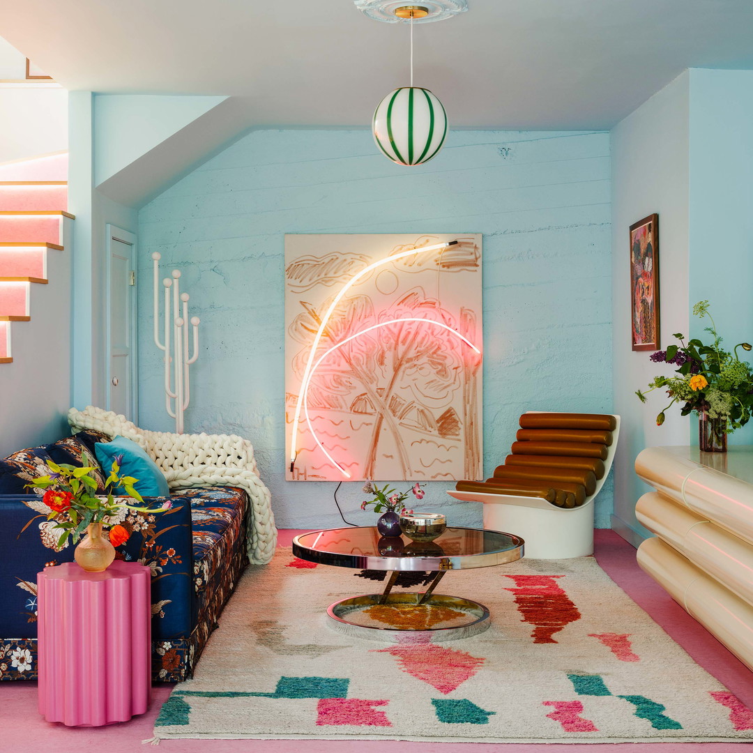 a living room filled with furniture and decor