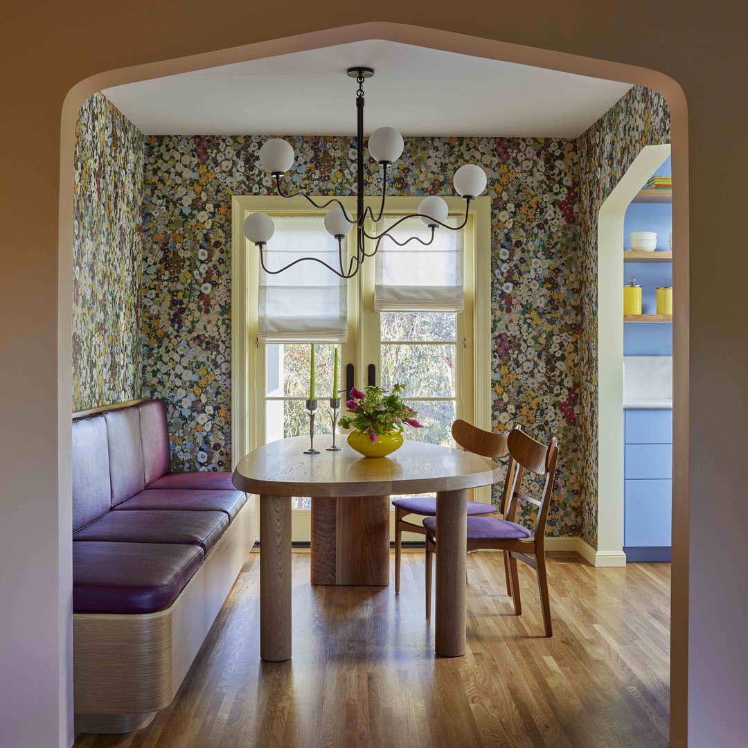 a room with a table and a bench in it