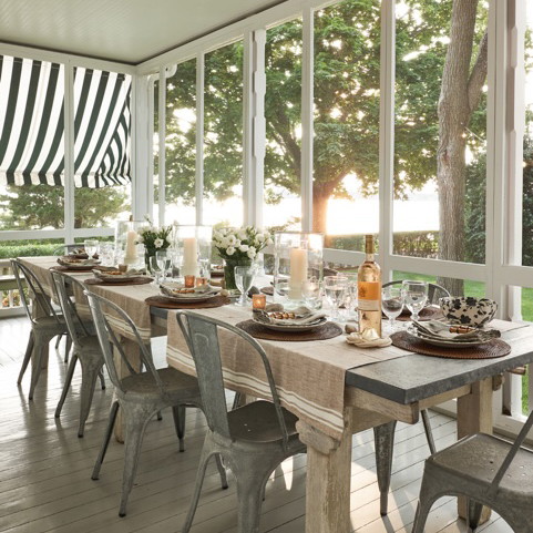 a dining room with a table and chairs