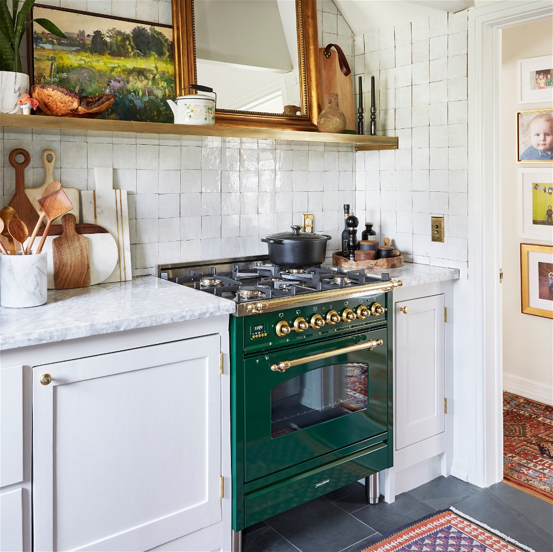 a kitchen with a green stove top oven