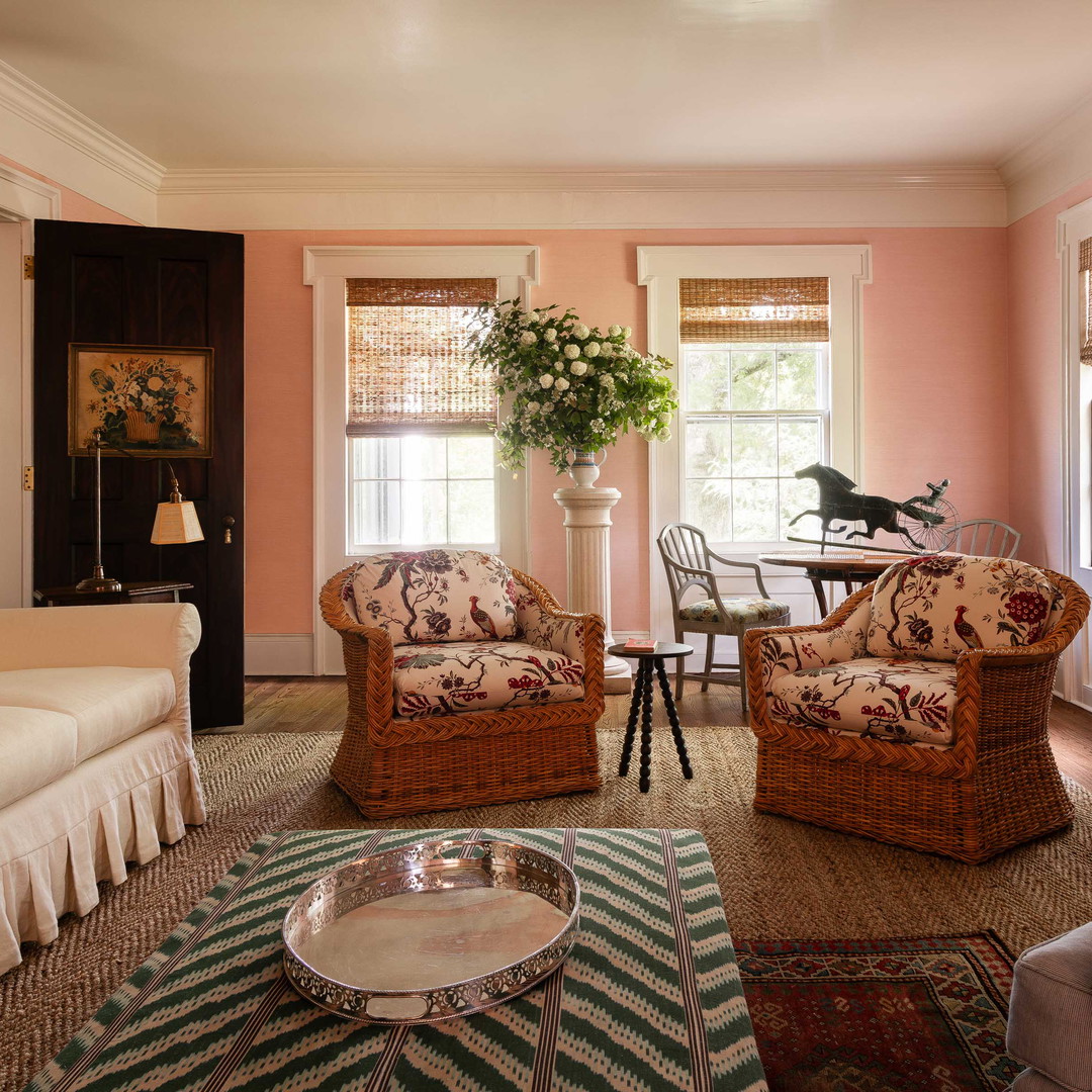 a living room filled with furniture and a fire place