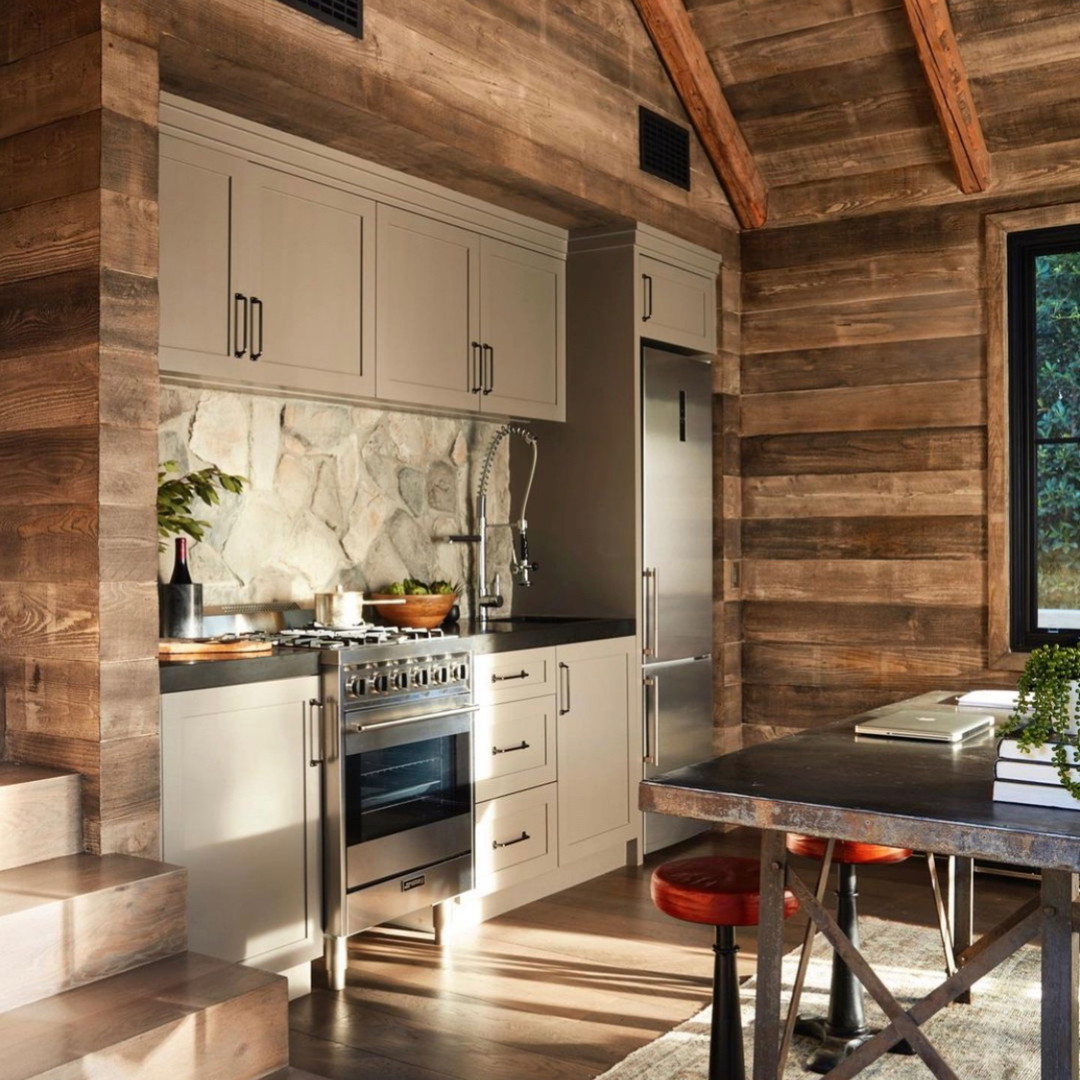 a kitchen with a table and a stove