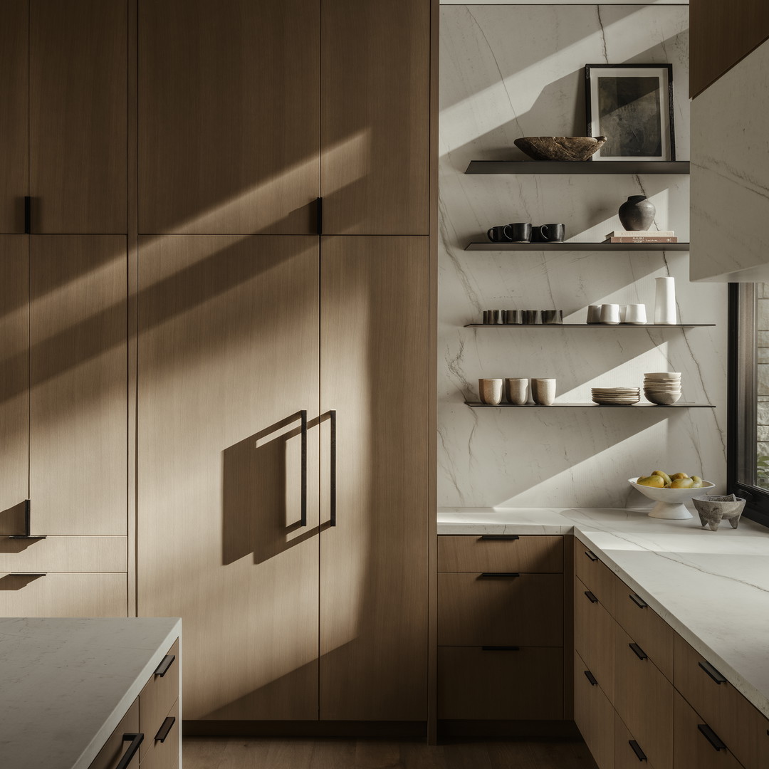 a kitchen with wooden cabinets and white counter tops