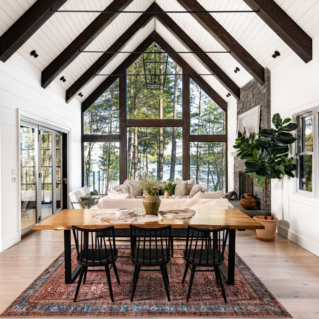 a dining room with a table and chairs