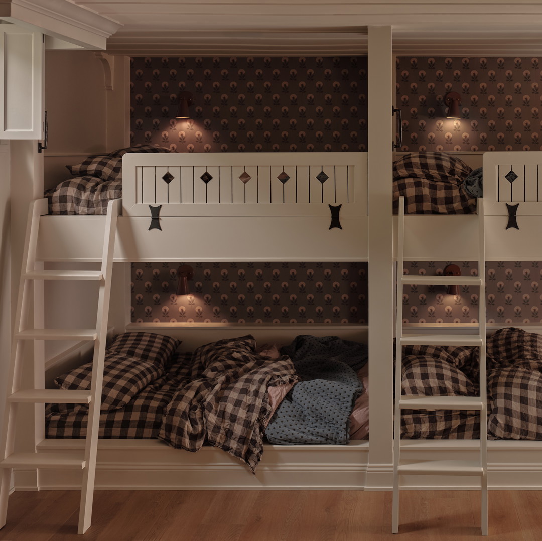 a couple of bunk beds sitting next to each other