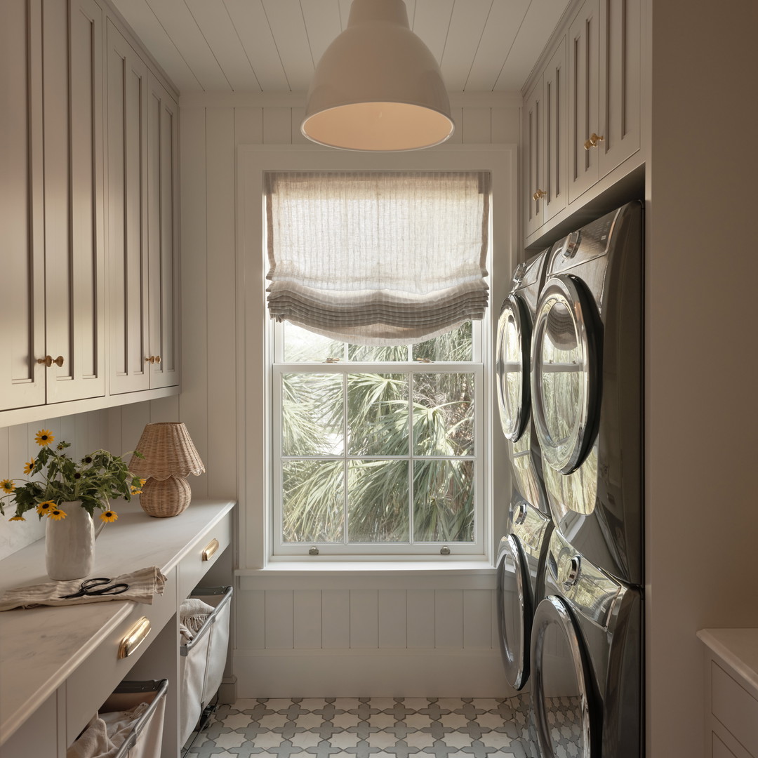 a laundry room with a washer and dryer