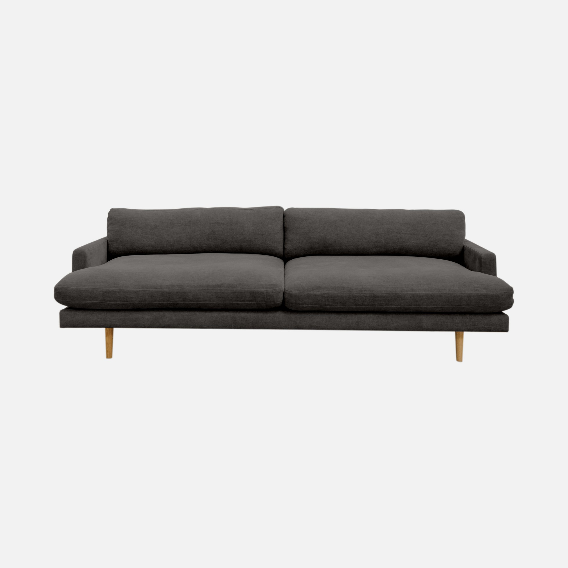 a gray couch with a wooden legs