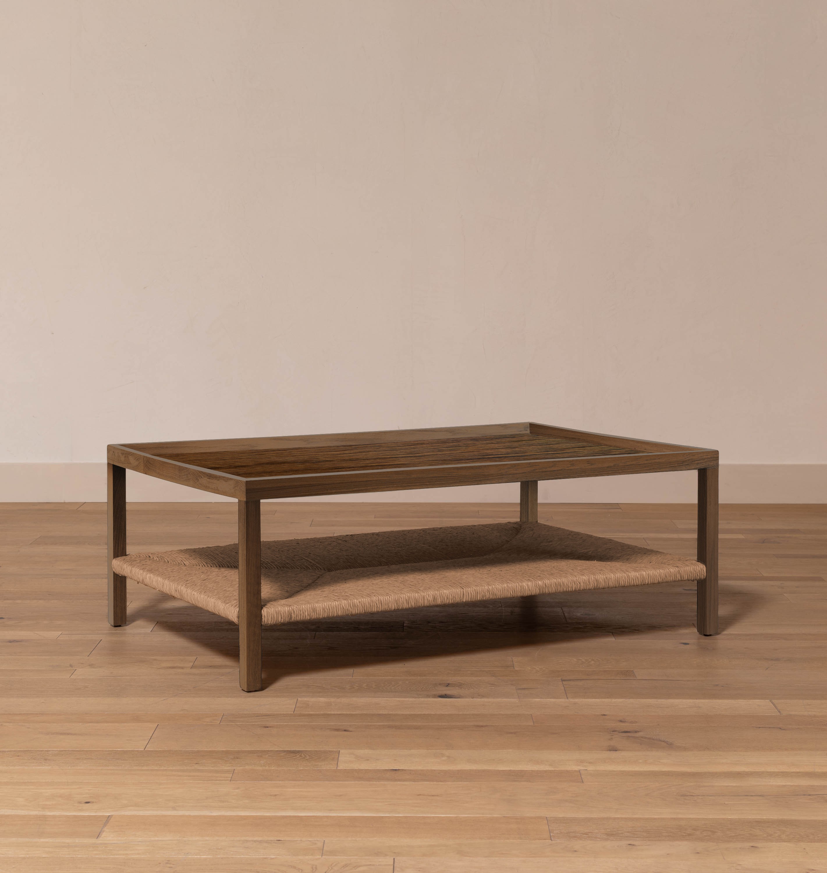 a coffee table with a shelf on top of it