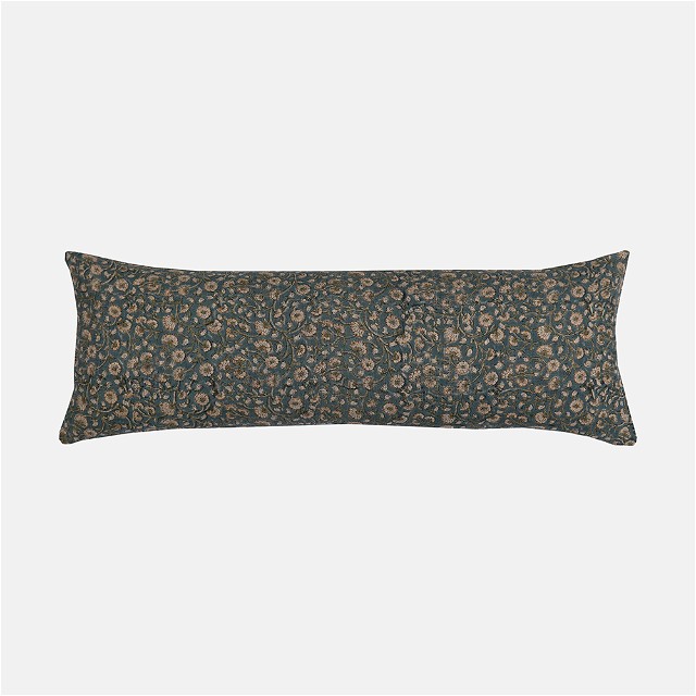 a rectangular pillow with a flower pattern on it