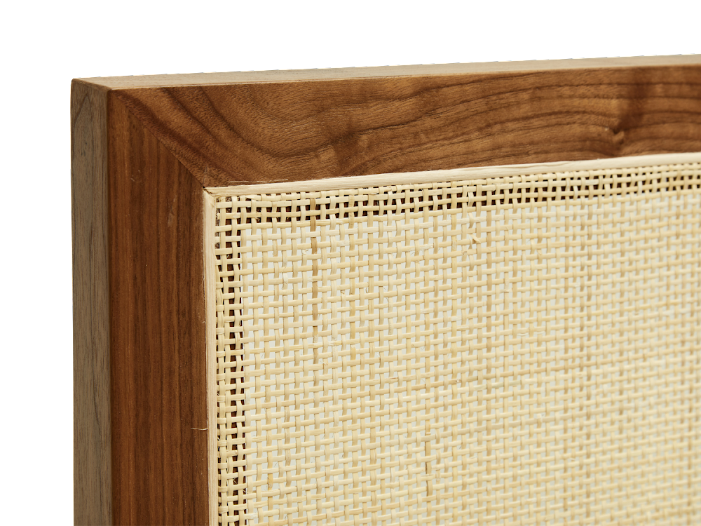 a close up of a wooden frame with woven material